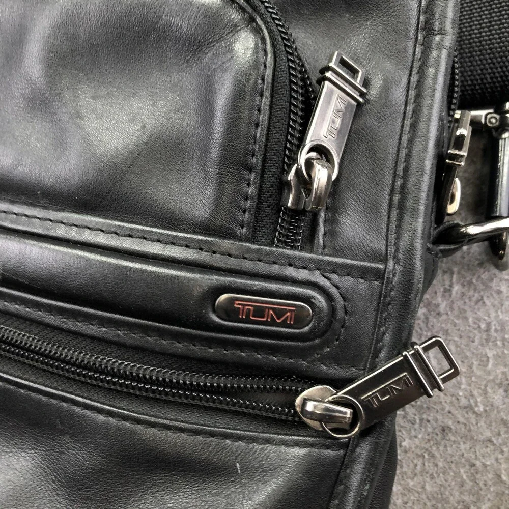 Tumi black leather